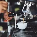 Person Using Espresso Machine