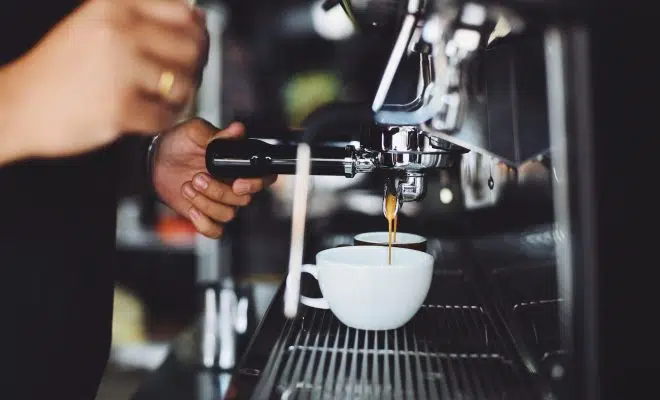 Person Using Espresso Machine